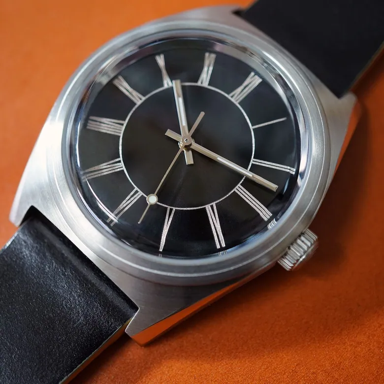 Intaglio 38: “Radial Roman” Black & Zinc Dial