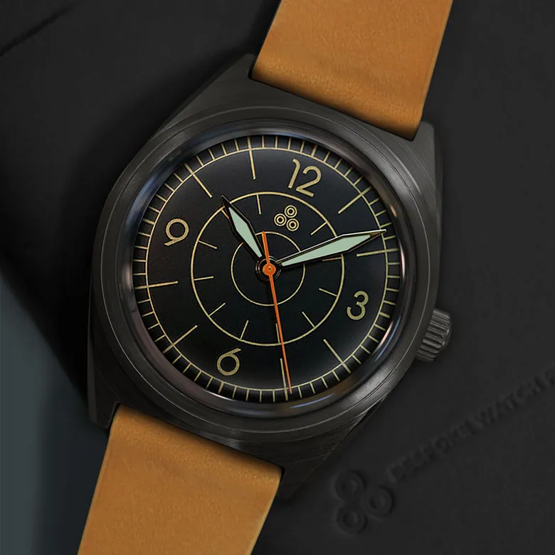 Intaglio 38 Tonneau: “Neu Sector” Brass & Carbon Dial