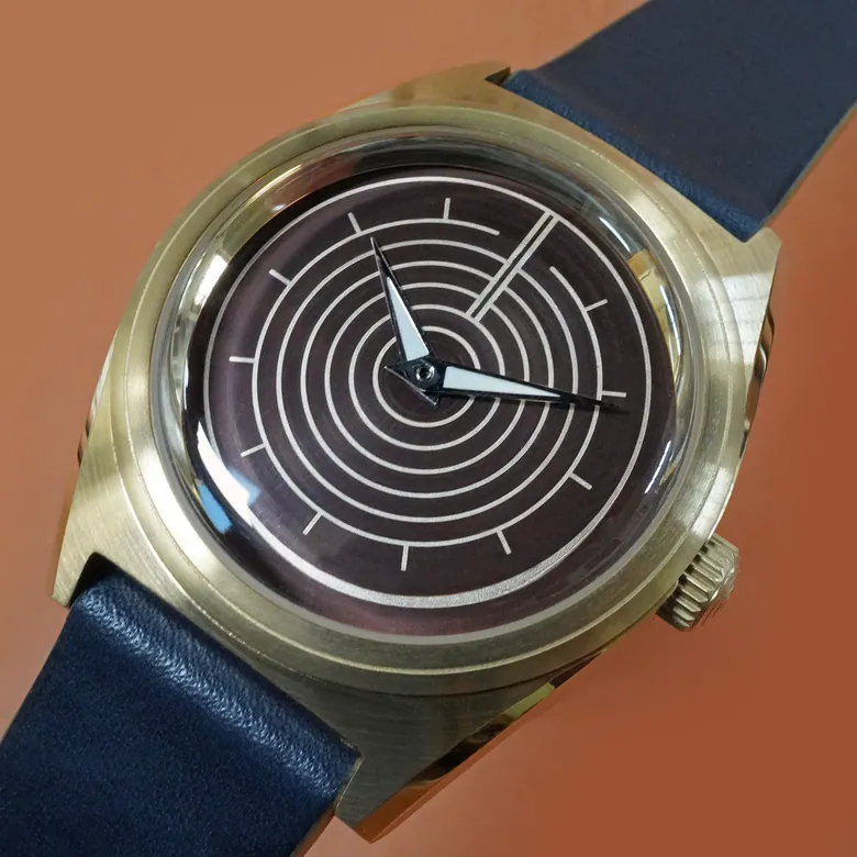 Intaglio 38: “Daytum” Brown & Sterling Dial