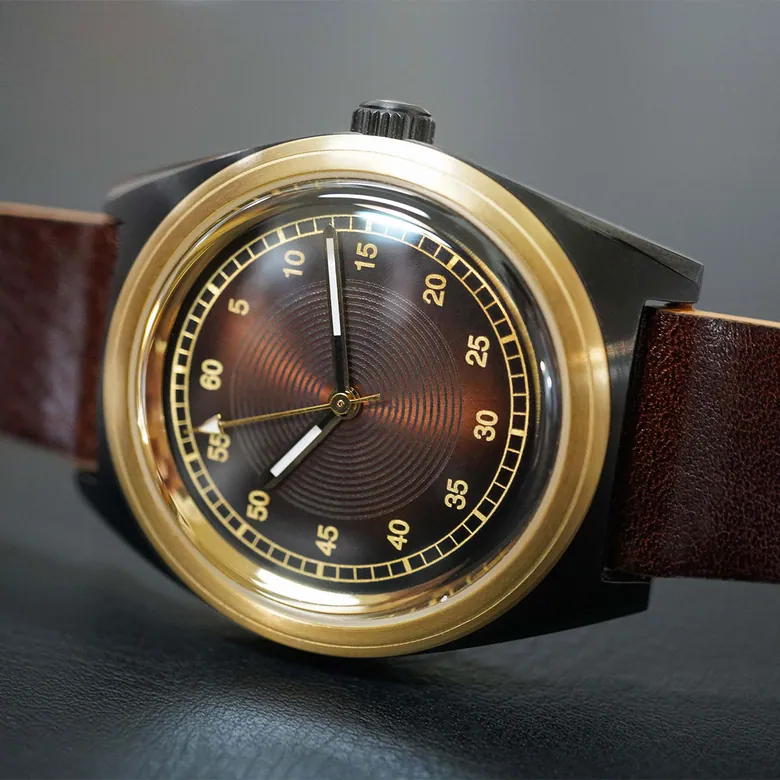 Intaglio 38: “60 Scale” Amber & Brass Dial