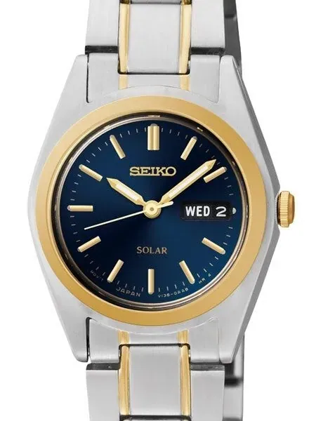 Seiko Two-Tone Women's Solar Dress Watch with Blue Dial, Goltone Hands and Markers #SUT110
